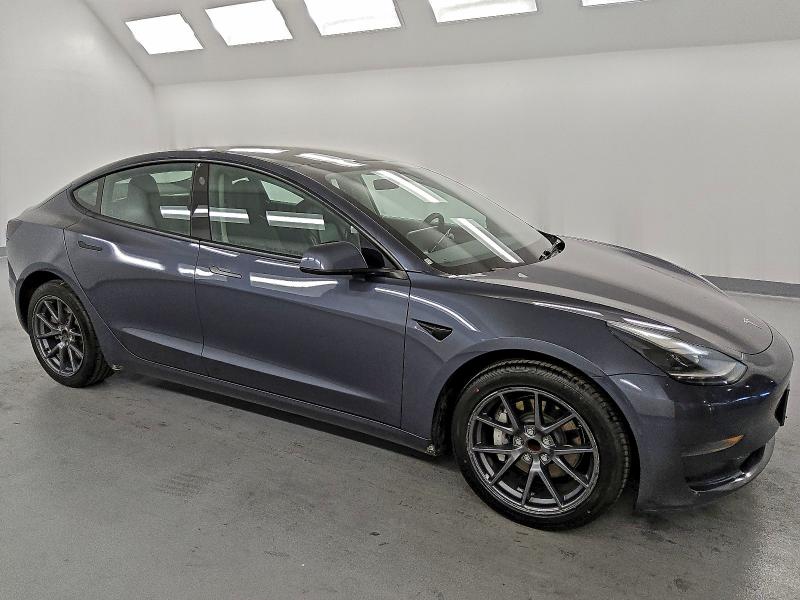Photo 4 from auction – 2022 TESLA MODEL 3 with VIN 5YJ3E1EA4NF289320