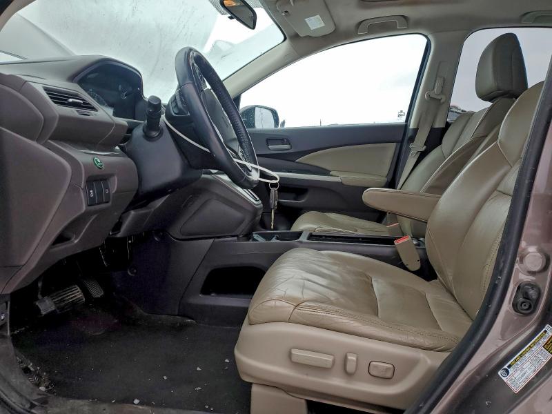 Photo 7 from auction – 2014 HONDA CR-V EXL with VIN 2HKRM4H75EH629137