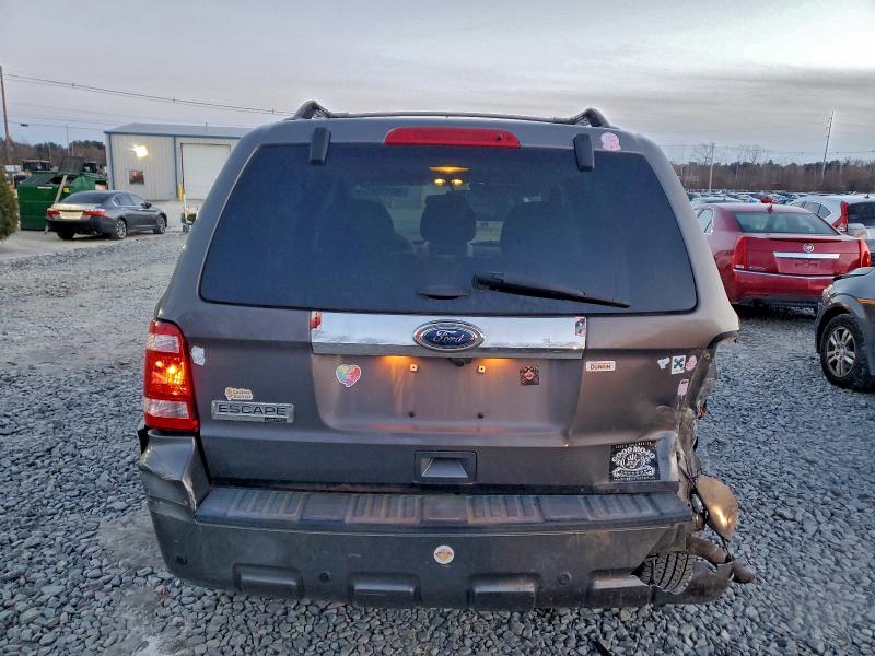 Photo 6 from auction – 2012 FORD ESCAPE LIM with VIN 1FMCU9E73CKC72896