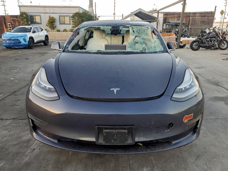 Photo 5 from auction – 2020 TESLA MODEL 3 with VIN 5YJ3E1EA7LF718009