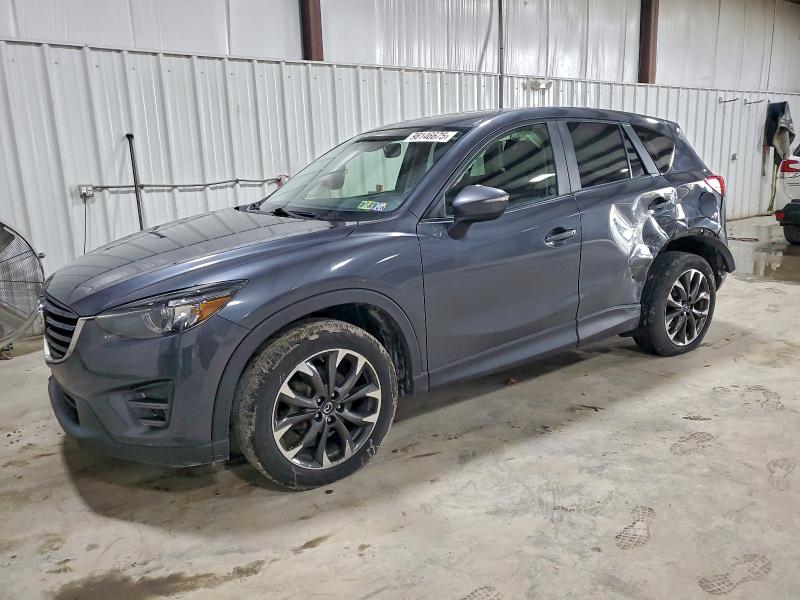 MAZDA CX-5 GT 2016 with VIN JM3KE4DY2G0671107 - Photo from auction