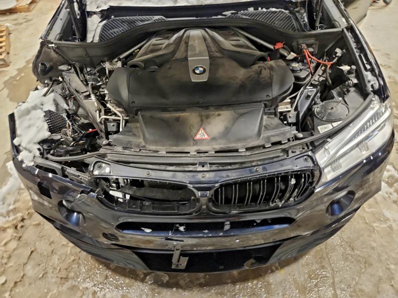 Photo 12 from auction – 2014 BMW X5 XDRIVE5 with VIN 5UXKR6C51E0J73475