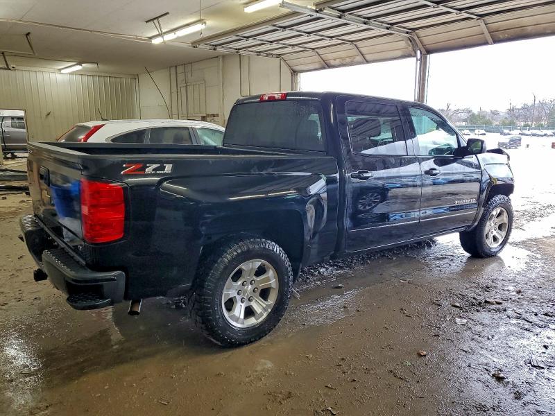 Photo 3 from auction – 2018 CHEVROLET SILVERADO with VIN 3GCUKREC9JG221757