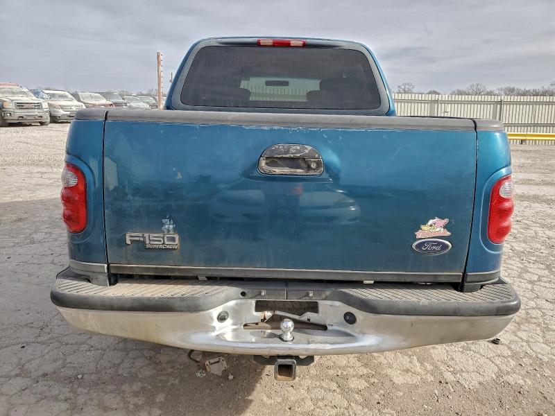 Photo 6 from auction – 2001 FORD F150 with VIN 1FTRW07L51KB95752