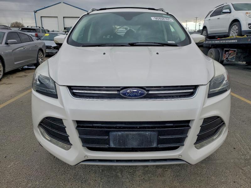 Photo 5 from auction – 2016 FORD ESCAPE TIT with VIN 1FMCU9J97GUC79691