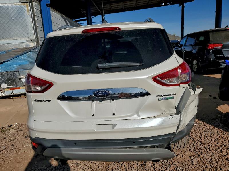 Photo 6 from auction – 2014 FORD ESCAPE TIT with VIN 1FMCU0J90EUE41072