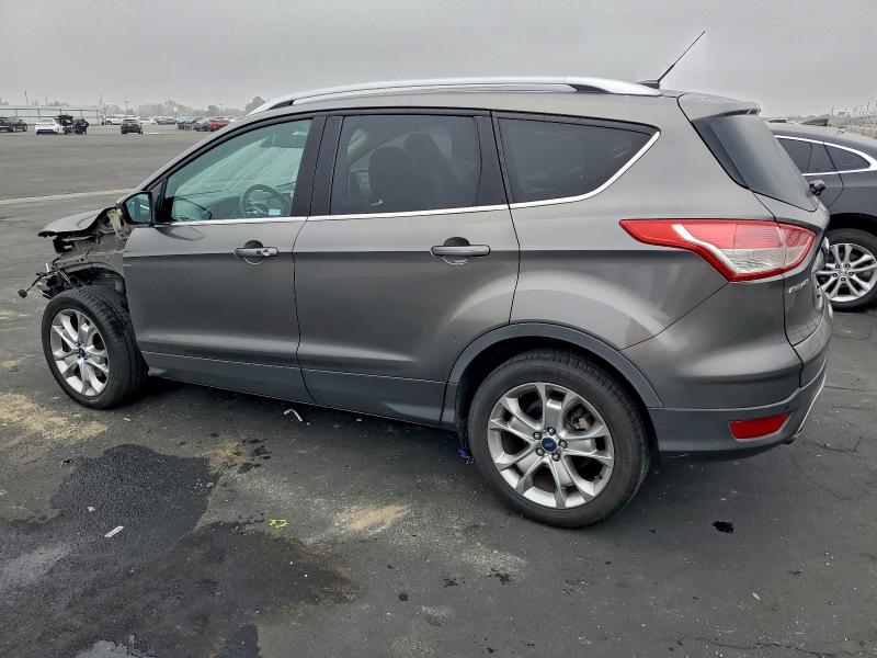 Photo 2 from auction – 2014 FORD ESCAPE TIT with VIN 1FMCU0J98EUB47919