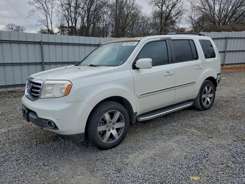 HONDA PILOT TOUR 2013 with VIN 5FNYF3H96DB004163 - Photo from auction