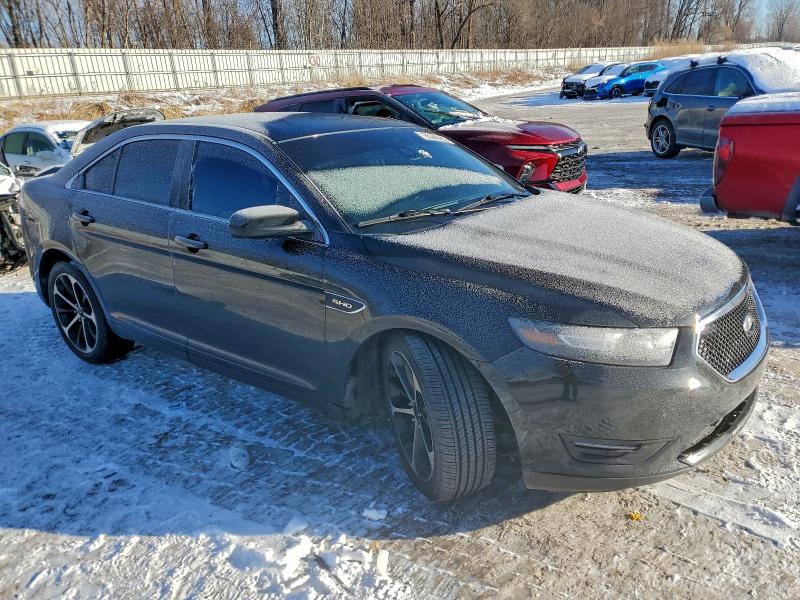 Photo 4 from auction – 2014 FORD TAURUS SHO with VIN 1FAHP2KT3EG133941
