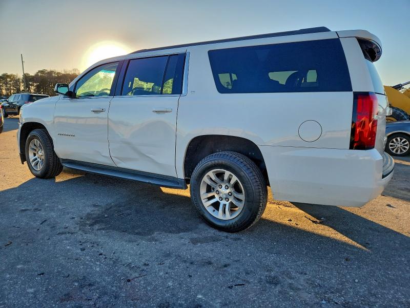 Photo 2 from auction – 2019 CHEVROLET SUBURBAN with VIN 1GNSCHKCXKR202999