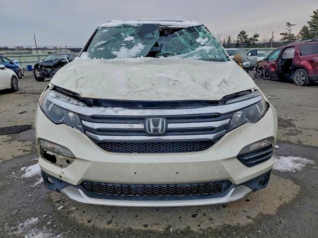 Photo 5 from auction – 2017 HONDA PILOT EXL with VIN 5FNYF6H62HB041904
