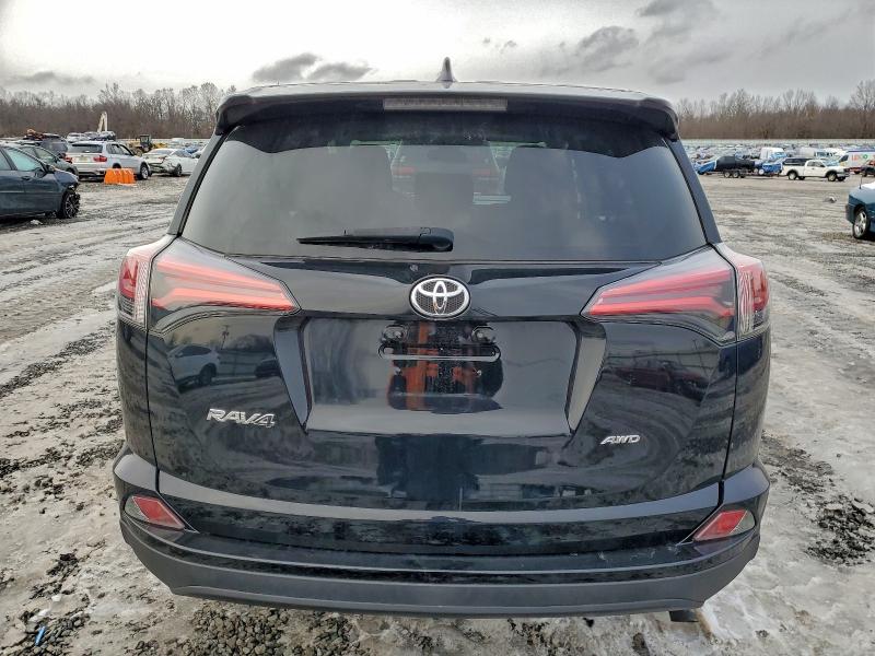 Photo 6 from auction – 2018 TOYOTA RAV4 LE with VIN 2T3BFREV2JW727492