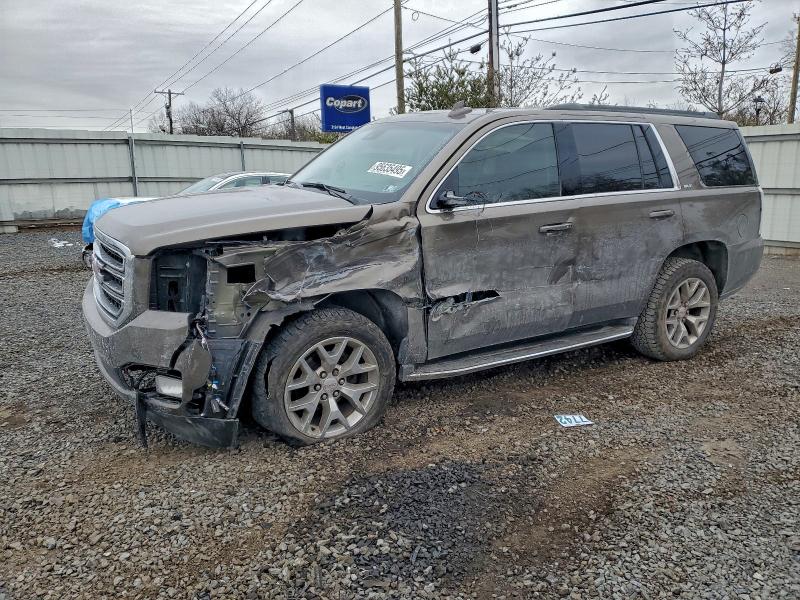 GMC YUKON SLT 2016 with VIN 1GKS2BKC2GR223205 - Photo from auction