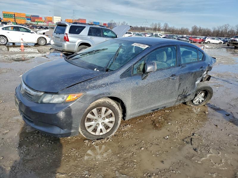 HONDA CIVIC LX 2012 with VIN 19XFB2F52CE102737 - Photo from auction