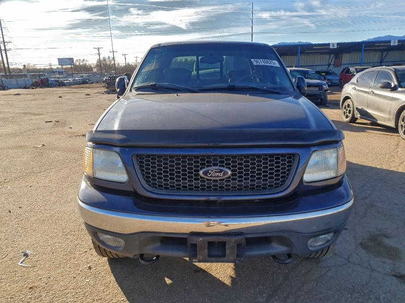 Photo 5 from auction – 2003 FORD F150 SUPER with VIN 1FTRW08L73KA57339