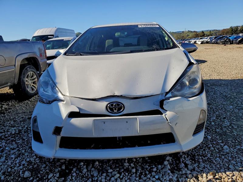 Photo 5 from auction – 2013 TOYOTA PRIUS C with VIN JTDKDTB38D1048142