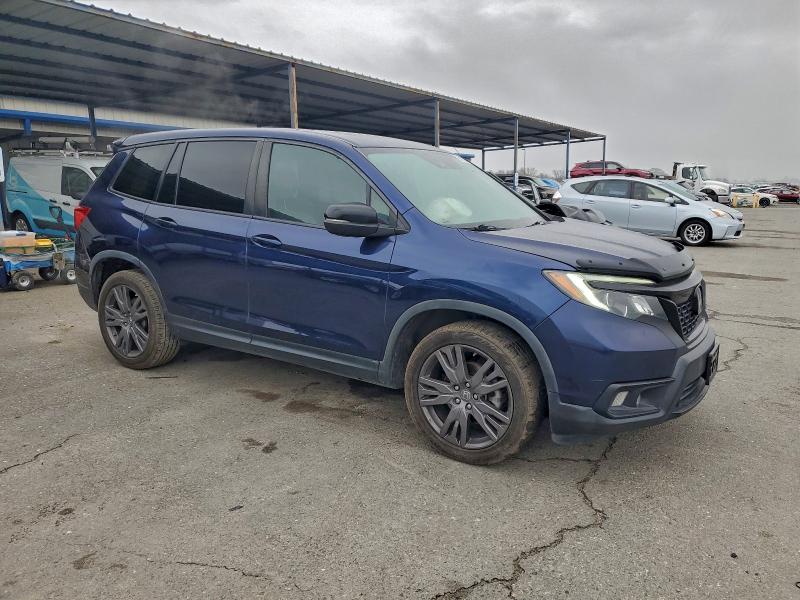Photo 4 from auction – 2020 HONDA PASSPORT E with VIN 5FNYF7H54LB001233