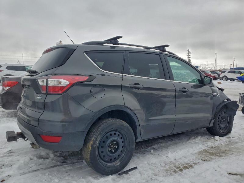 Photo 3 from auction – 2017 FORD ESCAPE SE with VIN 1FMCU9G90HUB23601