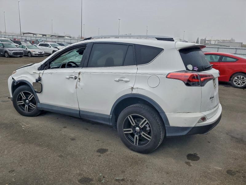 Photo 2 from auction – 2017 TOYOTA RAV4 LE with VIN 2T3ZFREV6HW319232