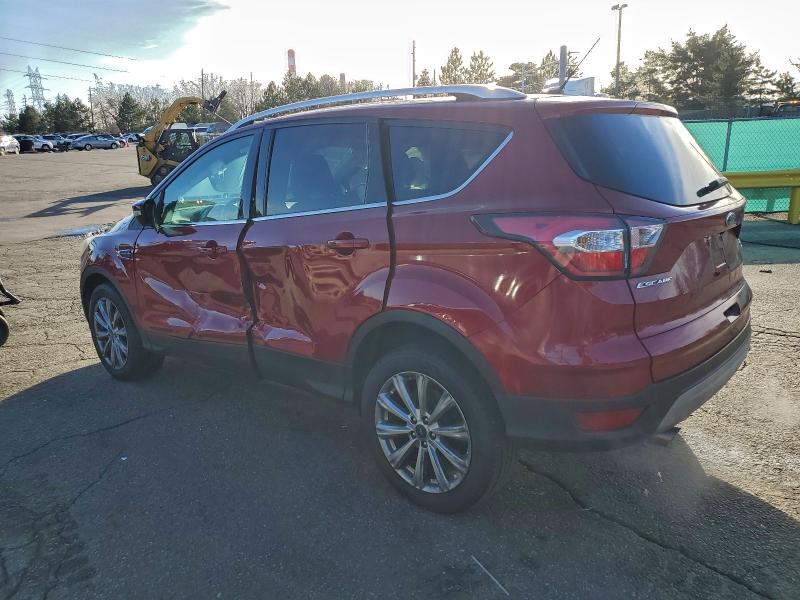 Photo 2 from auction – 2017 FORD ESCAPE TIT with VIN 1FMCU9J95HUA23101