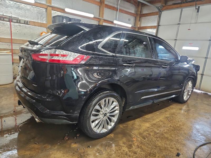 Photo 3 from auction – 2021 FORD EDGE TITAN with VIN 2FMPK4K98MBA41116
