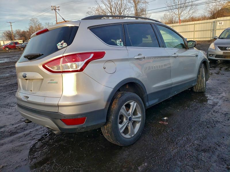 Photo 3 from auction – 2016 FORD ESCAPE SE with VIN 1FMCU0GX4GUB06907