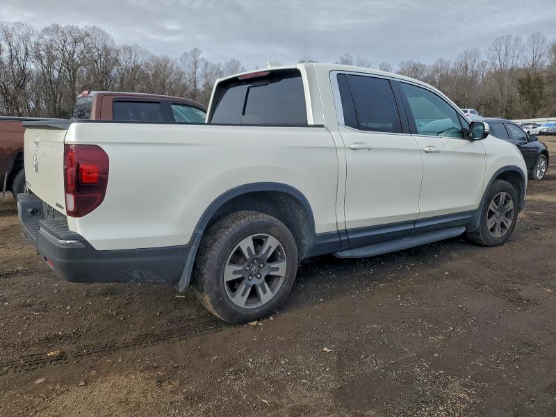 Photo 3 from auction – 2019 HONDA RIDGELINE with VIN 5FPYK3F57KB017861