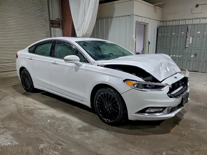 Photo 4 from auction – 2017 FORD FUSION TIT with VIN 3FA6P0K98HR131406