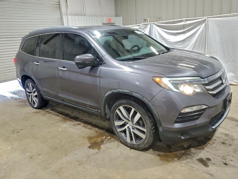 Photo 4 from auction – 2017 HONDA PILOT TOUR with VIN 5FNYF5H97HB024245