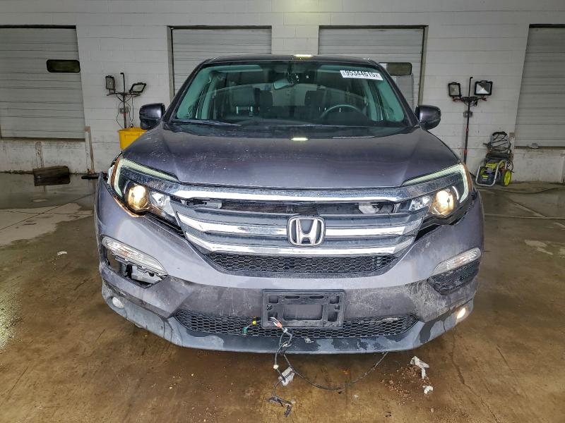 Photo 5 from auction – 2018 HONDA PILOT EXL with VIN 5FNYF6H52JB057145