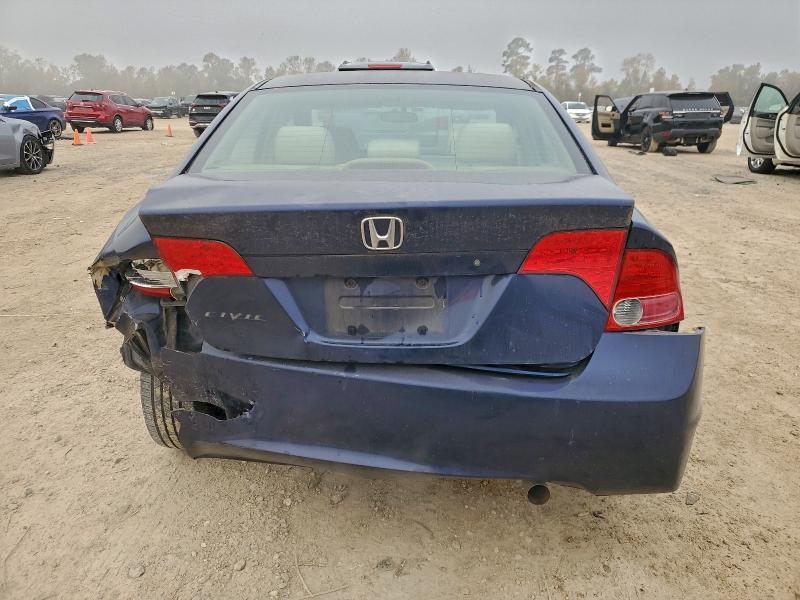 Photo 6 from auction – 2006 HONDA CIVIC LX with VIN 1HGFA16556L097852