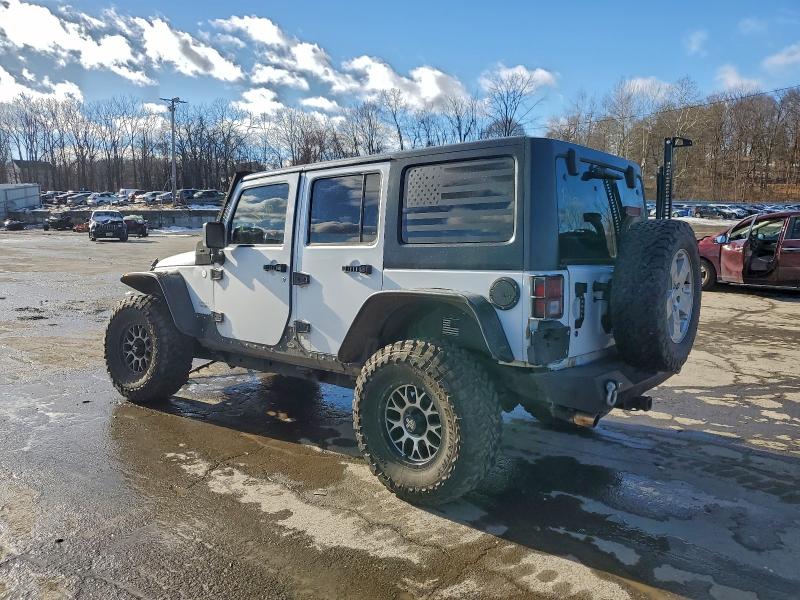 Photo 2 from auction – 2012 JEEP WRANGLER U with VIN 1C4BJWEG9CL125645