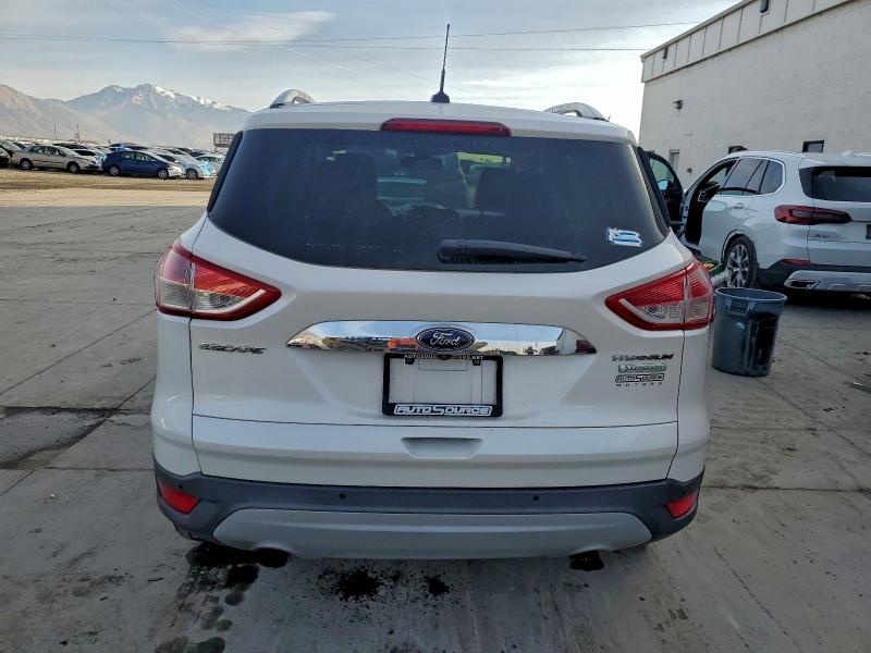 Photo 6 from auction – 2014 FORD ESCAPE TIT with VIN 1FMCU0J96EUA63338