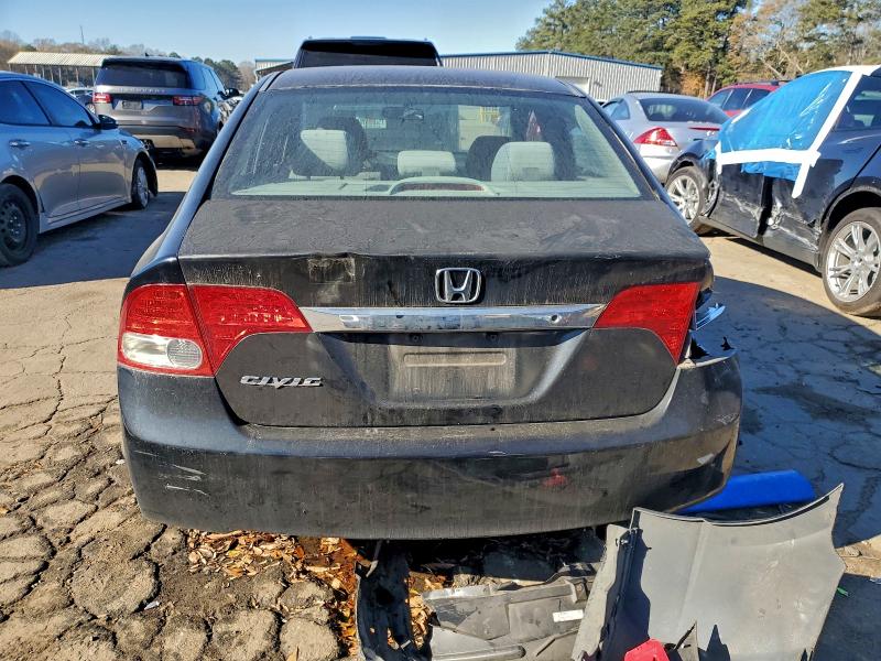 Photo 6 from auction – 2011 HONDA CIVIC LX with VIN 19XFA1F55BE012073