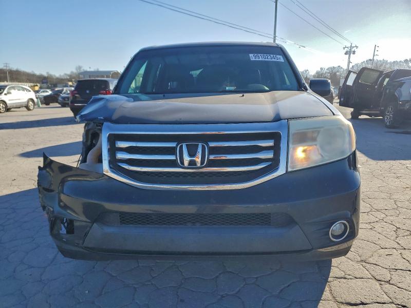 Photo 5 from auction – 2015 HONDA PILOT TOUR with VIN 5FNYF4H96FB004673