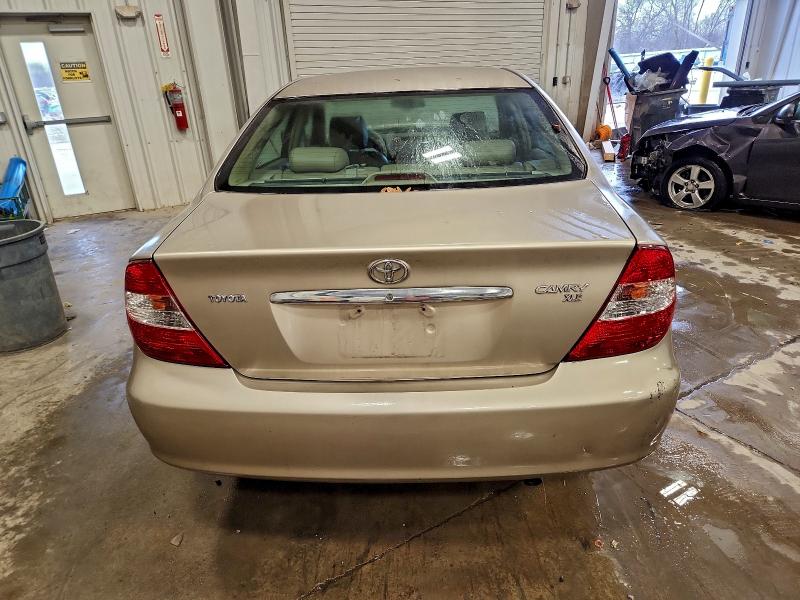 Photo 6 from auction – 2004 TOYOTA CAMRY LE with VIN 4T1BE30K74U925057