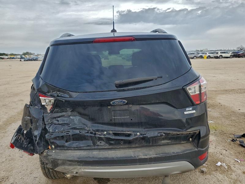 Photo 6 from auction – 2018 FORD ESCAPE SE with VIN 1FMCU0GD0JUD19902