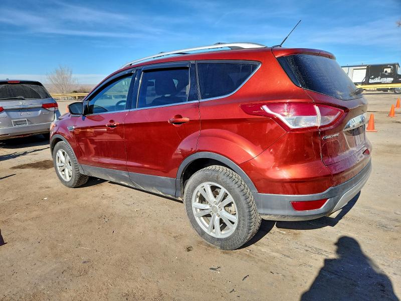 Photo 2 from auction – 2015 FORD ESCAPE TIT with VIN 1FMCU9J98FUA52346