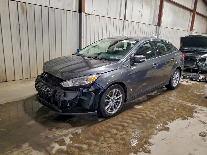 FORD FOCUS SE 2017 with VIN 1FADP3F29HL322062 - Photo from auction