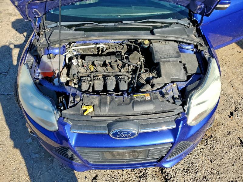 Photo 11 from auction – 2014 FORD FOCUS SE with VIN 1FADP3F21EL206690