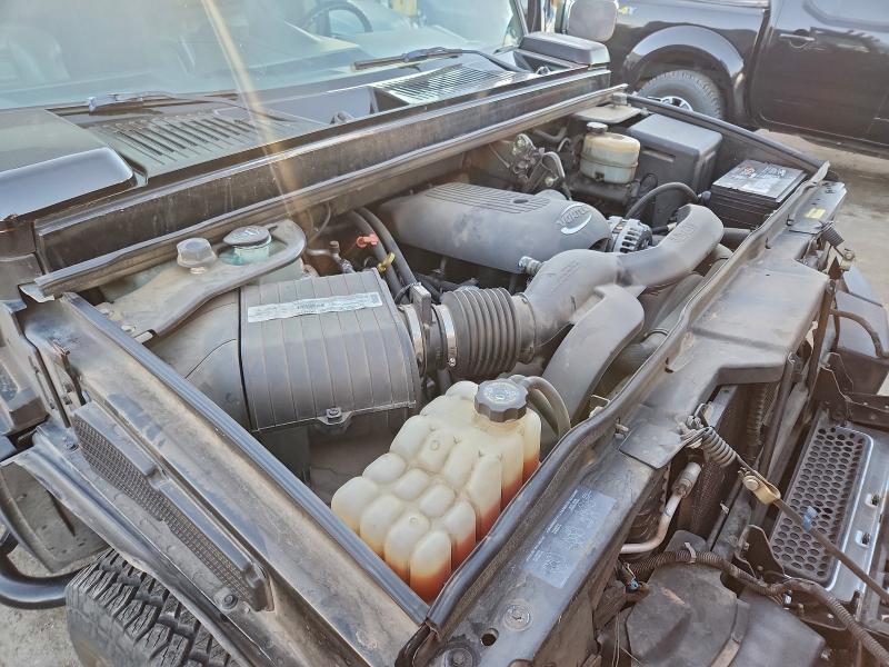 Photo 12 from auction – 2003 HUMMER H2 with VIN 5GRGN23U63H113367