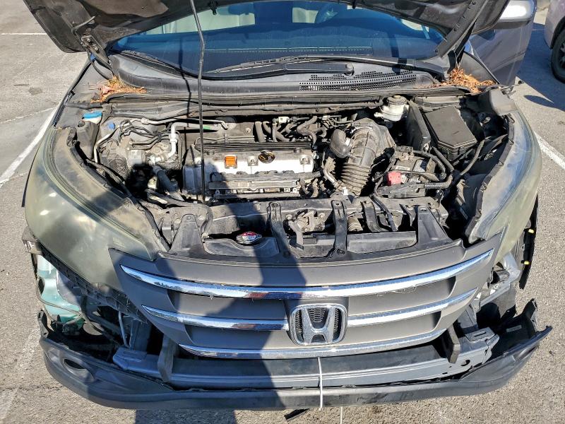 Photo 11 from auction – 2013 HONDA CR-V EX with VIN 3CZRM3H50DG707639