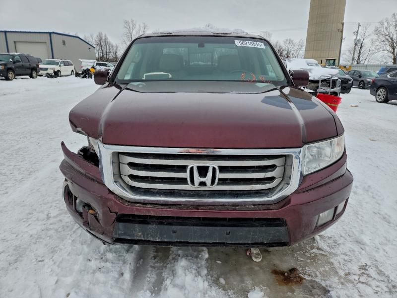 Photo 5 from auction – 2012 HONDA RIDGELINE with VIN 5FPYK1F50CB458723