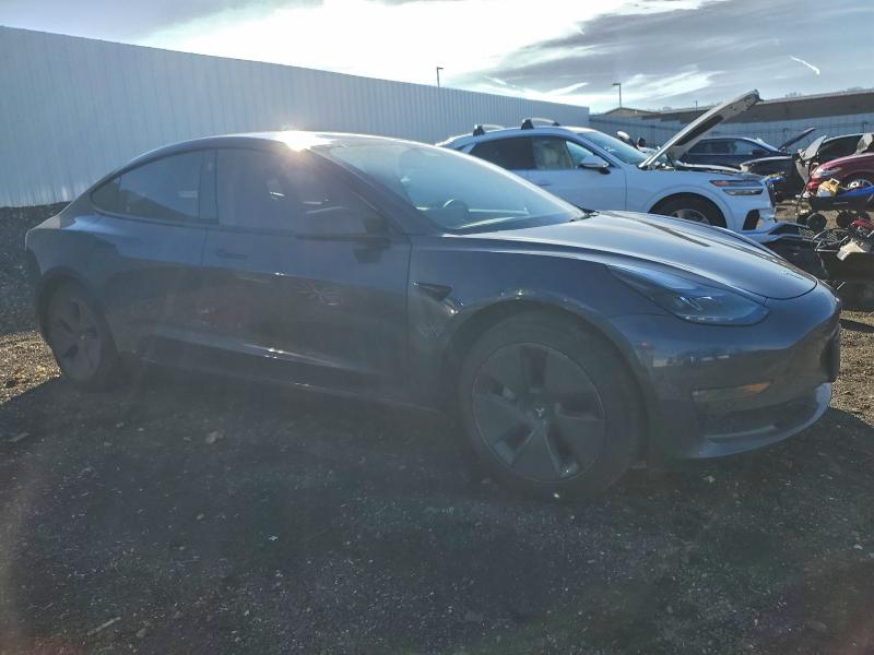 Photo 4 from auction – 2022 TESLA MODEL 3 with VIN 5YJ3E1EB2NF123189