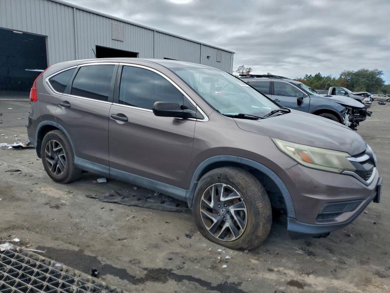 Photo 4 from auction – 2016 HONDA CR-V SE with VIN 2HKRM3H47GH520259