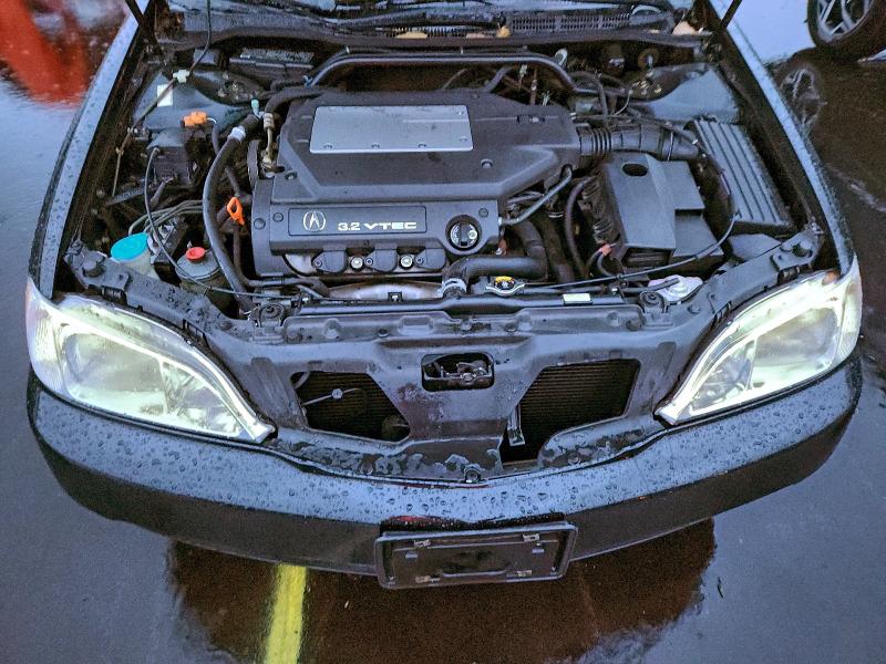 Photo 11 from auction – 2000 ACURA 3.2TL with VIN 19UUA5660YA007593