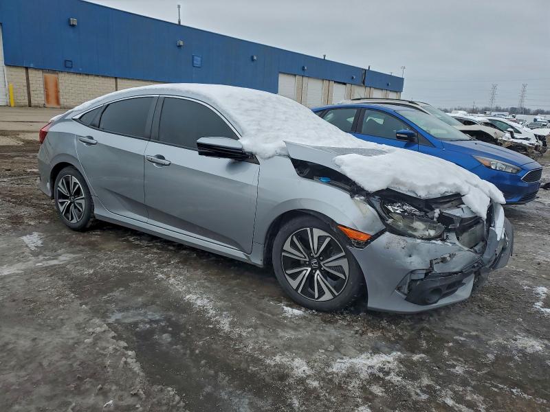 Photo 4 from auction – 2017 HONDA CIVIC EX with VIN 19XFC1F3XHE005024