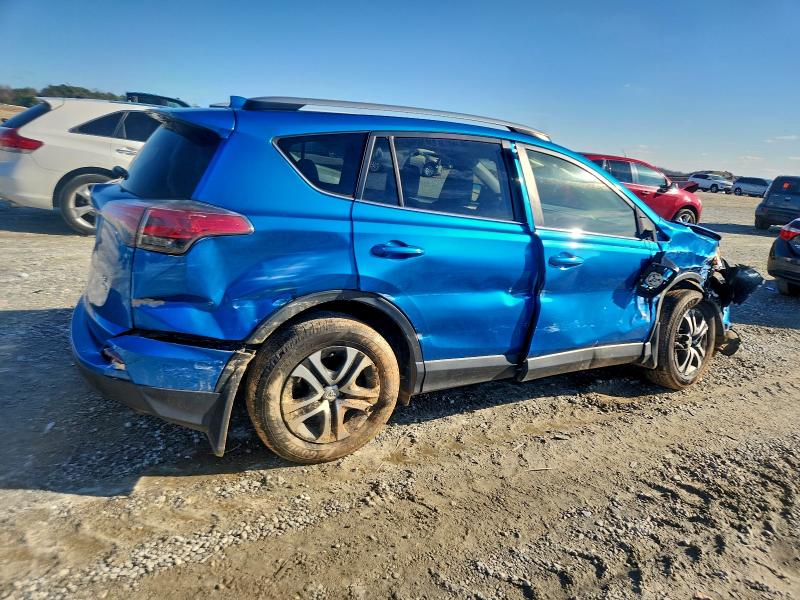 Photo 3 from auction – 2017 TOYOTA RAV4 LE with VIN JTMBFREV5HJ703969