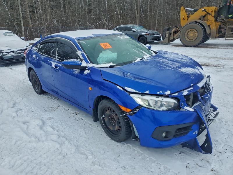 Photo 4 from auction – 2016 HONDA CIVIC LX with VIN 2HGFC2F54GH024972