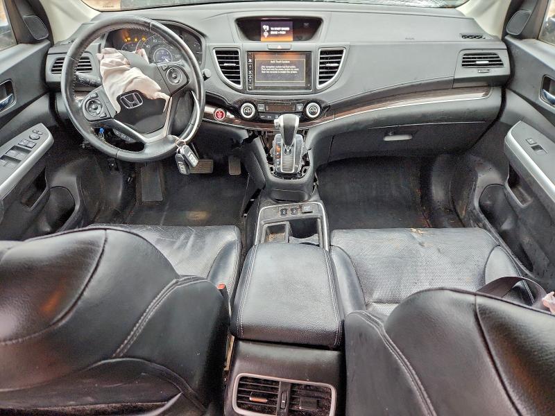Photo 8 from auction – 2015 HONDA CR-V with VIN 2HKRM4H74FH623184